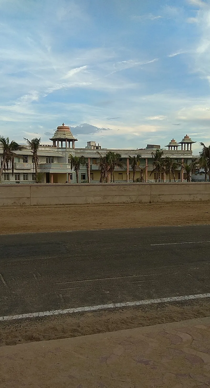 The front facade of Birla Guest House from the road
